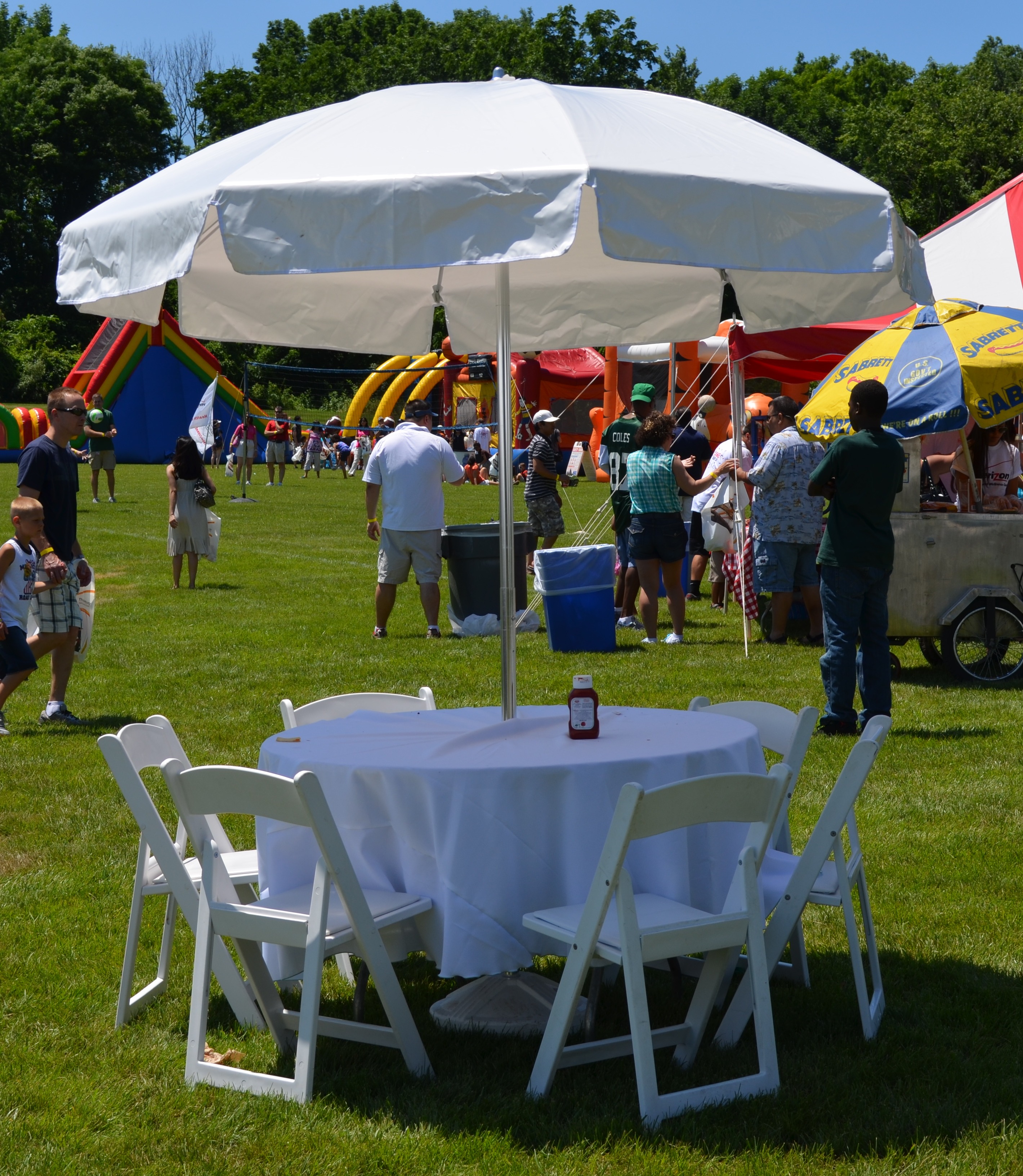 Round Table- 48 Umbrella Table  Image